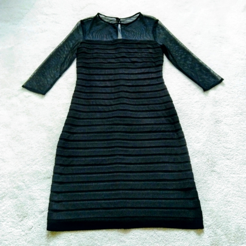 Black bodycon dress with mesh upper and sleeves